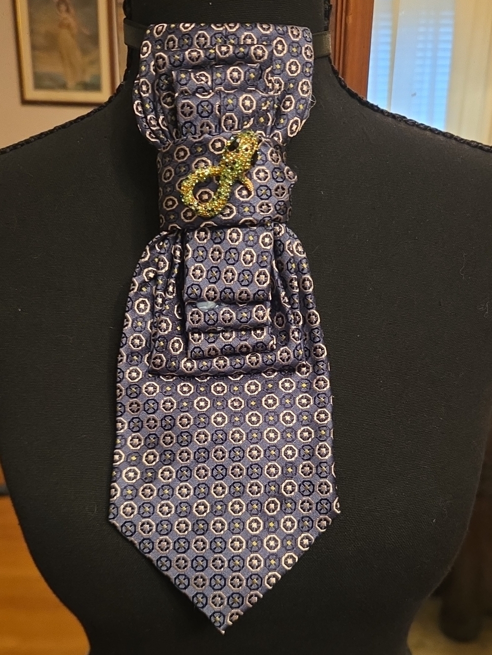 Classic Navy Patterned Cravat with Green Accent Brooch